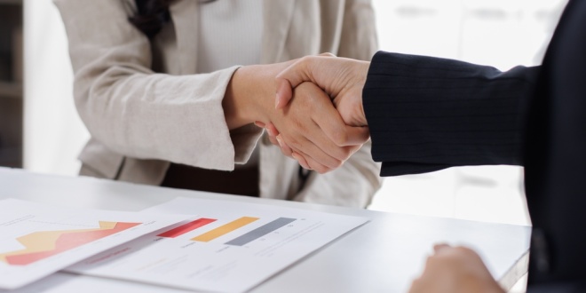 business handshake, as the Gambling Commission appoints Sarah Fox