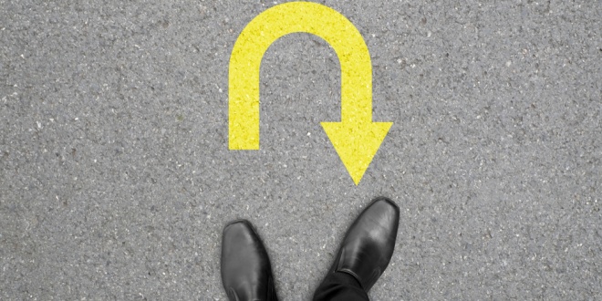 u-turn, representing Entain making 500 staff redundant