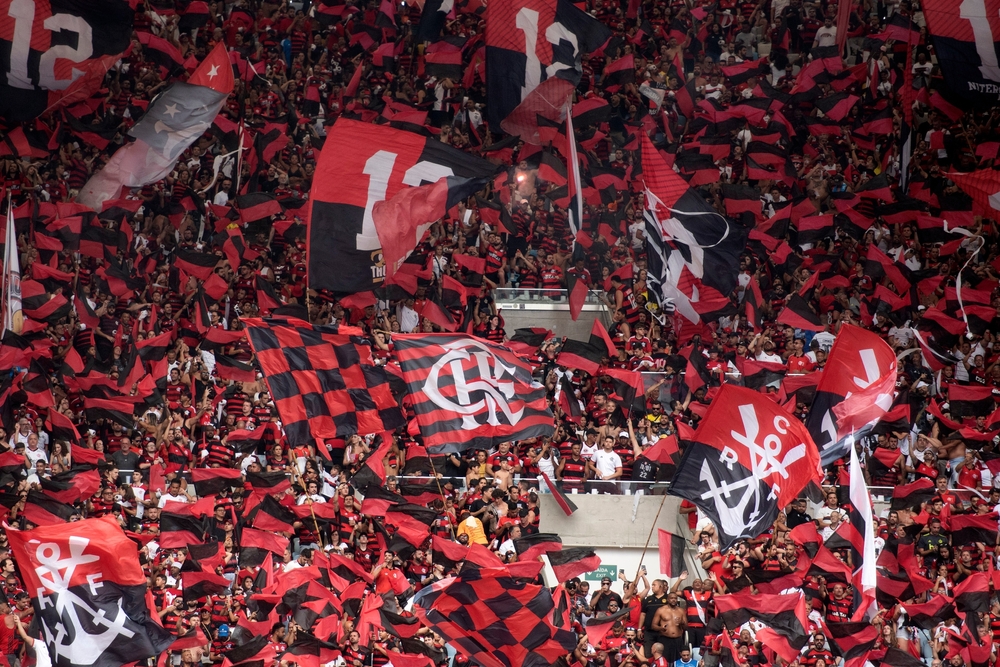 Fans of Rio football club Flamengo celebrate in the stands in Brazil, a key target market for FIRST.bet