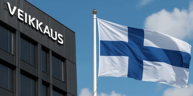 A Finnish flag in front of the Veikkaus building