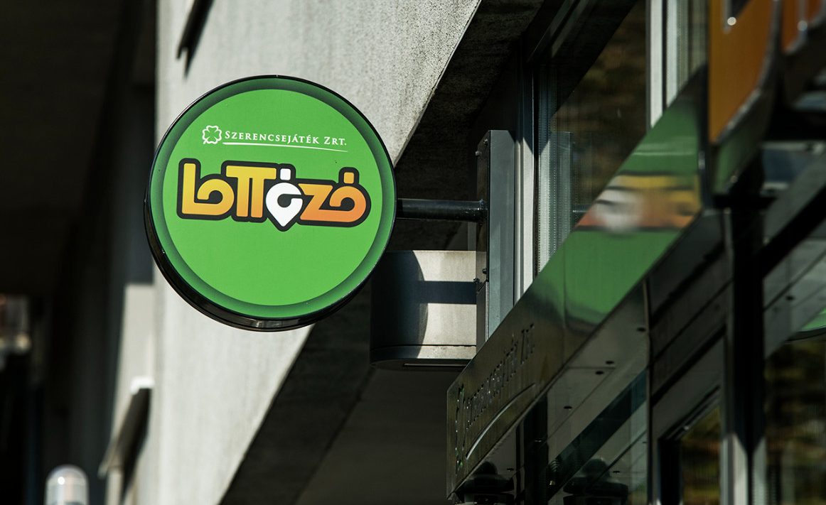 A Szerencsejatek Zrt sign on a Hungarian street