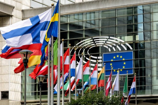 Flags of EU member nations and the EU in Brussels, Polymarket is currently lobbying the trade bloc