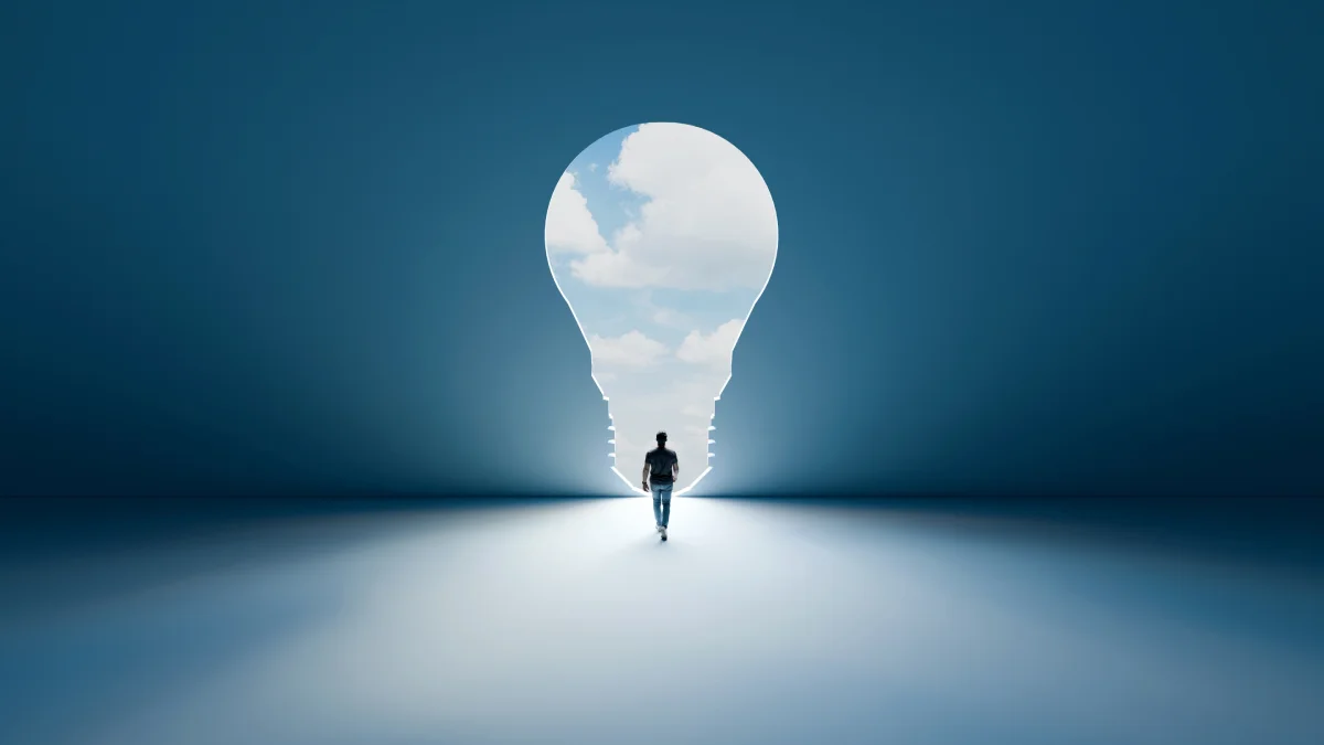 A man walks into a lightbulb, illustrating Kambi's renewal.