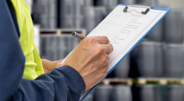 A man holding a list