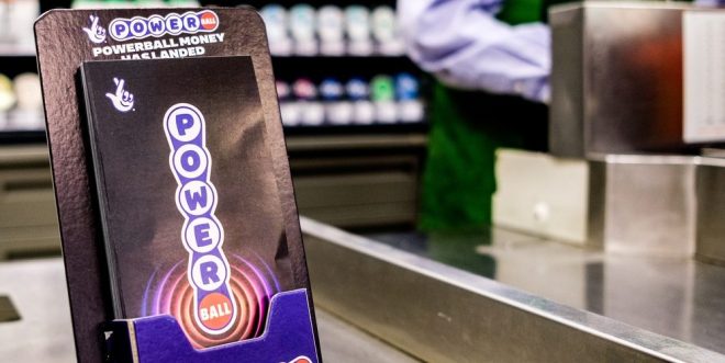 A National Lottery Powerball product stand at a retailer