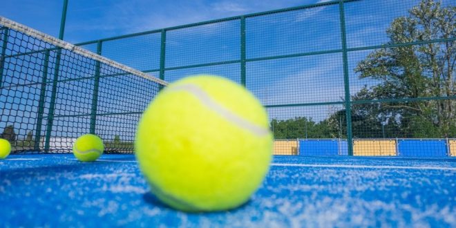 a padel ball on a court, representing Premier Padel