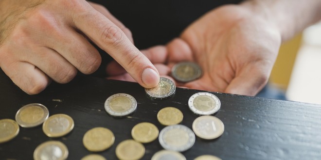 coins, representing BetStop and ACMA controversy in Australia