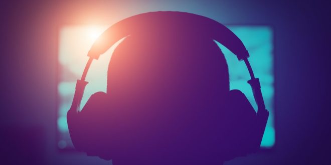 An esports gamer wearing a headset