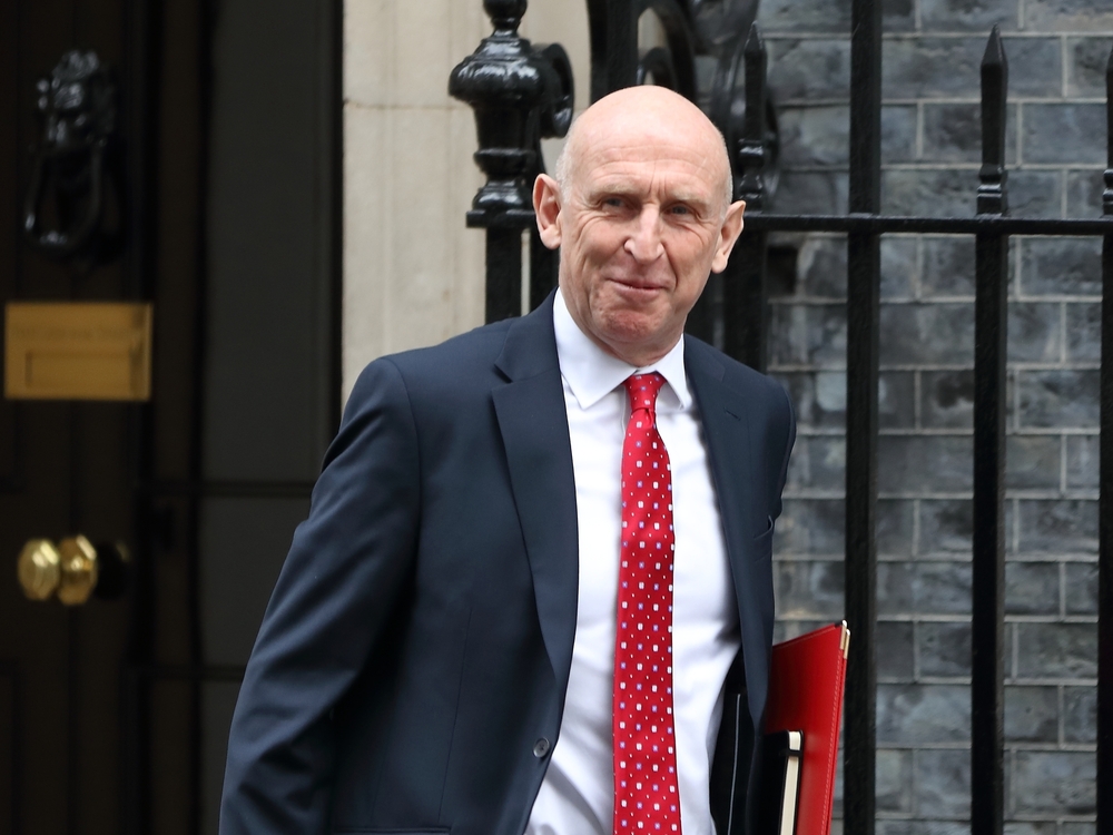 John Healey, Chancellor of the Exchequer, with the classic red brief case of the UK budget