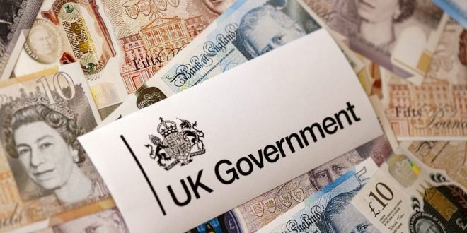 UK government sign amid paper bank notes